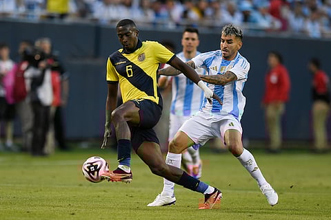 William Pacho and Angel Correa battles for the ball